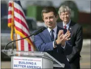  ?? STEPHEN B. MORTON — THE ASSOCIATED PRESS ?? U.S. Transporta­tion Secretary Pete Buttigieg speaks to the media during a visit to the Georgia Ports Authority’s Megarail facility, Dec., 17, in Savannah, Ga.