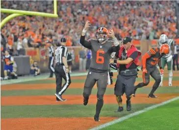  ?? AP PHOTO/DAVID RICHARD ?? Cleveland Browns quarterbac­k Baker Mayfield celebrates during Thursday night’s 21-17 win against the New York Jets.