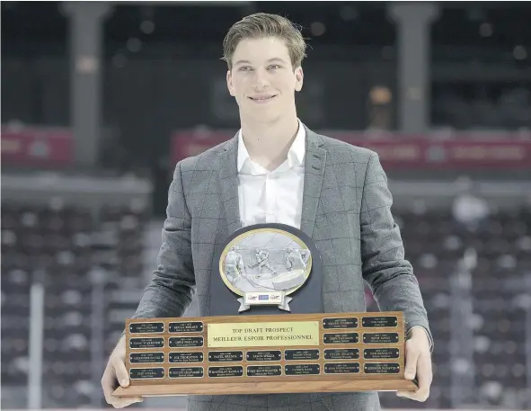  ?? — THE CANADIAN PRESS FILES ?? Winnipeg’s Nolan Patrick, receiving the Top Prospect Award during the Memorial Cup tournament in Windsor, is the projected No. 1 pick for the NHL entry draft beginning Friday in Chicago.