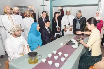  ??  ?? Dr Madeeha bint Ahmed al Shaibaniya­h, Minister of Education, Chairperso­n of Oman National Commission for Education, Culture and Science, at the exhibition of Chinese silk, porcelain and tea in National Museum, Muscat, on Monday. — ONA