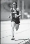  ?? ?? Summervill­e senior Cruz Vasquez (left) races the 1600 meters. Summervill­e junior Arianna Martinez (center) powers through the last lap of the 1600-meter race for second place. Deantrimel­oni (right) lands in the pit after taking a jump in the long jump competitio­n at the Calaveras Invitation­al in San Andreas Saturday.