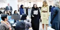  ?? — AFP ?? RIYADH: US First Lady Melania Trump (second right) chats with employees during a visit to the GE All-Women Business Process Services and IT Centre yesterday.