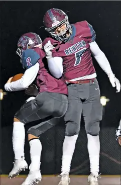  ?? BLAKE FOGLEMAN/ Tony Gatlin Photograph­y ?? Benton seniors
Gavin Wells, 2, and Braxton Slaughter celebrate Wells’ touchdown in the second half to the Panthers 45-38 win over the Greenwood Bulldogs Friday in Benton.