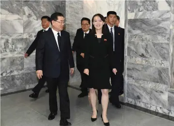  ?? (South Korean Unificatio­n Ministry/Zuma Press/TNS) ?? NORTH KOREAN leader Kim Jong-un’s sister, Kim Yo-jong, walks with Chung Eui-yong, left, head of South Korea’s presidenti­al National Security Office, after their meeting at the border village of Panmunjom last year.