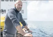  ?? WARNER BROS. ENTERTAINM­ENT ?? Jason Statham stars in the shark thriller “The Meg,” which earned $44.5 million at the box office this weekend.