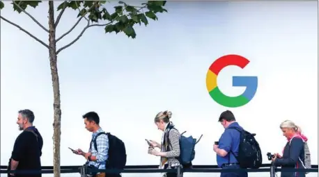  ?? ELIJAH NOUVELAGE/AFP ?? In this file photo taken on October 4 last year, people wait to enter a Google product launch event on at the SFJAZZ Center in San Francisco, California.