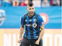  ?? GRAHAM HUGHES/THE CANADIAN PRESS ?? Montreal Impact’s Saphir Taider celebrates after scoring against Columbus Crew SC during the first half of Saturday’s MLS soccer game at Saputo Stadium.