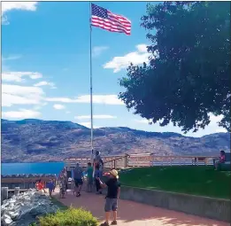  ?? File photo ?? Peachland was portrayed as an American town, complete with Old Glory flying over the waterfront, during the shooting of a movie this fall,