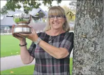  ??  ?? Anne Bennett from Dundee walked away with the John D Gillies Memorial Trophy for her solo performanc­e in the competitor’s choice Skye or Sutherland song. 17_MOD43dm06_wednesdays­olo