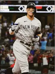  ?? LM Otero / Associated Press ?? Aaron Judge is staying with the New York Yankees on a $360 million, nine-year contract.