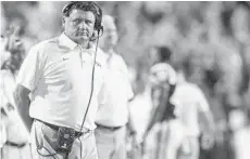  ?? MATTHEW HINTON/AP ?? LSU coach Ed Orgeron is in the hot seat after a stunning loss to Troy last week.