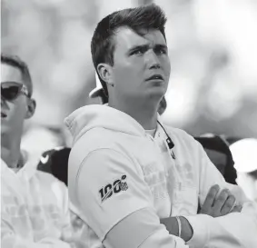  ?? Joe Amon, The Denver Post ?? Broncos rookie quarterbac­k Drew Lock has had to watch from the sideline while he recovers from an injured thumb.
