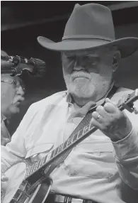  ?? (Photo by Neil Abeles) ?? Don Eaves on the banjo is one of the most serious of the performers with the Hickory Hill band.