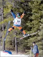  ?? NEWS PHOTO RYAN MCCRACKEN ?? Conner Hurry performs a trick in the 2016 Alberta Winter Games freestyle moguls ski competitio­n at Hidden Valley Ski Resort. With COVID restrictio­ns in place, the resort is now open for the 2020/21 season.