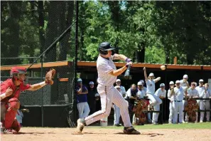  ?? The Sentinel-Record/James Leigh ?? ■ Fountain Lake’s Evan East connects with a ball for a hit during Friday’s game against Camden Fairview in the first round of the 4A-South Regional at Malvern. The Cobras won 3-2 in eight innings.