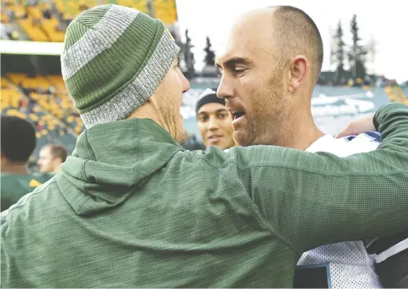  ?? ED Kaiser ?? Eskimos coach Jason Maas, left, and Ricky Ray were teammates in Edmonton, then adversarie­s when Ray was with the Argonauts.