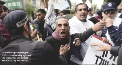  ?? PHOTO: FLASH 90 ?? TV workers protesting in Tel Aviv on Monday against the closure of the Israeli Broadcasti­ng Authority