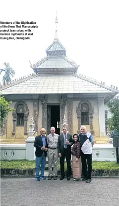  ??  ?? Members of the Digitisati­on of Northern Thai Manuscript­s project team along with German diplomats at Wat Duang Dee, Chiang Mai.