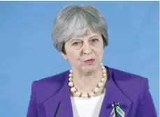  ?? — AFP ?? Britain’s Prime Minister Theresa May gives a speech on public life to mark the centenary of women’s suffrage in Manchester on Tuesday.