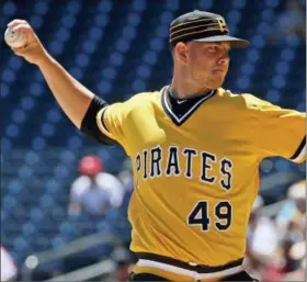  ?? GENE J. PUSKAR — THE ASSOCIATED PRESS ?? Pittsburgh Pirates starting pitcher Nick Kingham delivers in the first inning of a baseball game against the Philadelph­ia Phillies in Pittsburgh, Sunday.