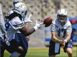  ?? AP ?? Longtime quarterbac­k Philip Rivers (17) will practice at Chargers Park for the final time today. The club heads for its new home in Los Angeles after minicamp.