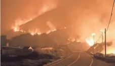  ?? NIC COURY/AP ?? The Colorado Fire burns along Highway 1 near Big Sur, Calif., on Saturday.