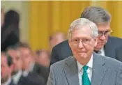  ?? AP PHOTO/MANUEL BALCE CENETA ?? Senate Majority Leader Mitch McConnell, R-Ky., front, and Attorney General William Barr arrive before President Donald Trump speaks in the East Room of the White House in Washington on Nov. 6.