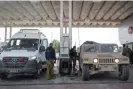  ?? Rosenfeld/Getty Images ?? Fuel appears to go to ordinary gas stations for domestic use – and for military personnel, who can refuel their vehicles under a government contract. Photograph: Alexi J