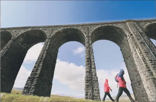  ?? PICTURE: GARY LONGBOTTOM. ?? STRIDING OUT: The Ribblehead Circular, taking in the Ribblehead Viaduct, is one of the 10 routes included in Northern’s campaign.