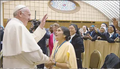  ?? AP ?? Pope Francis greets participan­ts in a special audience with members of the Internatio­nal Union of Superiors General in the Vatican.