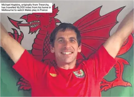  ??  ?? Michael Hopkins, originally from Treorchy, has travelled 16,000 miles from his home in Melbourne to watch Wales play in France