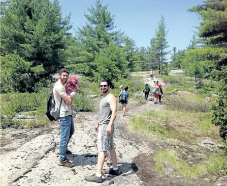  ?? SPECIALTO THE EXAMINER ?? The New Canadian Center under the leadership of Anne Elliott brought new Canadians to the Buckhorn market, the Kawartha Highlands Interpreti­ve trail and to Curve Lake. Ali Alrakhlani and Salim Bardakji enjoyed the trail with their children and other...