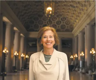  ?? Liz Hafalia / The Chronicle ?? Above: Beth Murray, managing director of San Francisco’s Performing Arts Center, in the lobby of the Opera House, where a private celebratio­n with 200 invitees will be held in her honor. Left: The War Memorial Opera House was closed for extensive renovation and earthquake repairs in 199697.