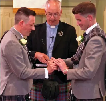  ??  ?? TV first: The wedding of Ian McDowall, left, and Jamie Wallace, shown on Songs of Praise