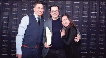  ?? CRA / Contribute­d photo ?? From left, Joseph Roberto, chef de cuisine; Joel Gargano, co-owner and chef; and Lani Gargano, co-owner of Grano Arso in Chester, at a 2019 award ceremony for the Connecticu­t Restaurant Associatio­n. Their restaurant is among those vying for awards this year.
