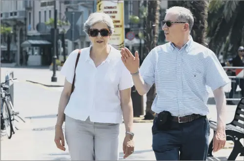  ??  ?? Prime Minister Theresa May and her husband Philip visit Desenzano del Garda in Italy, during their summer holiday.