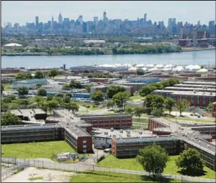  ?? AP ?? The No. 2 official at the city’s Department of Correction overseeing Rikers Island (above) resigned Friday amid accusation­s by a staffer of sexual harassment.