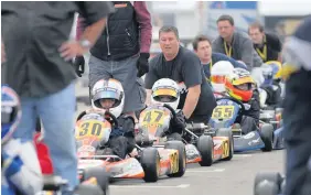  ??  ?? Lando Norris (number 47) with brother Oliver at start of Super Series 1 at Clay Pigeon circuit in Dorchester, one of the first races he went in. Behind him is coach Rob Dodds