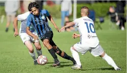  ?? ANDY JACKSON/STUFF ?? Rangers player Oskar Wano slips through a gap during his side’s 4-0 loss to Gisborne earlier in the season.