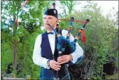  ?? PHOTO / MELANIE CAMOIN. ?? Bagpiper Arthur Johnstone playing at the opening of the last ART Waikino exhibition on Labour weekend.