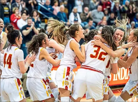  ?? Alexandra Wimley/Post-Gazette ?? North Catholic celebrates a victory over Blackhawk in the WPIAL Class 4A semifinal Monday at North Hills Middle School in Ross Township. North Catholic will go for a fourth consecutiv­e WPIAL title Friday.