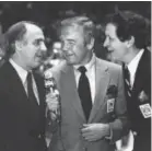  ?? Courtesy of NBC Sports ?? From left, Billy Packer, Dick Enberg and Al McGuire were a legendary trio in college basketball broadcasti­ng.