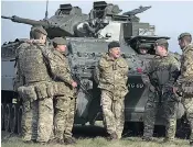  ??  ?? Army chief Gen Sir Nick Carter, soon to be head of the Armed Forces, meets soldiers of the Mercian Regiment on Salisbury Plain