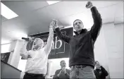  ?? ANTONELLA CRESCIMBEN­I/PITTSBURGH POST-GAZETTE VIA AP ?? CECIL ROBERTS, PRESIDENT OF THE UNITED MINE WORKERS (left) lifts up Democratic candidate Conor Lamb’s hand as the crowd erupts in cheers during a rally Sunday in Waynesburg, Pa.