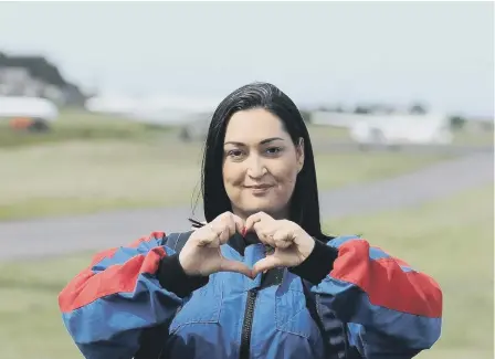  ??  ?? Gemma Lowery before her parachute jump last year.