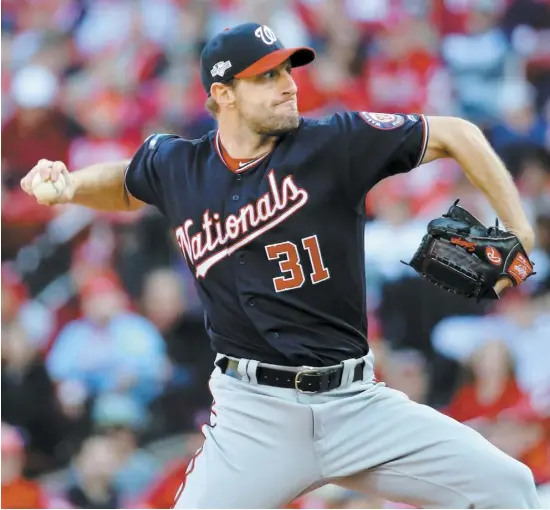  ?? PHOTO AFP ?? Max Scherzer a été impérial au monticule hier après-midi face aux frappeurs des Cardinals, réussissan­t 11 retraits au bâton et n’accordant qu’un seul coup sûr et seulement deux buts sur balle en sept manches de travail.