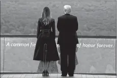  ?? EVAN VUCCI/AP PHOTO ?? President Donald Trump and first lady Melania Trump stand along the September 11th Flight 93 Memorial Tuesday in Shanksvill­e, Pa.