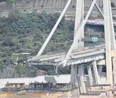  ?? Picture: AP. ?? Around 80 metres of the Morandi Bridge collapsed in torrential rain. At least 26 people have been killed.