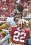  ?? Peter Diana/Post-Gazette ?? T.J. Watt eyes a loose ball he would end up recovering, one of five turnovers the 49ers committed.