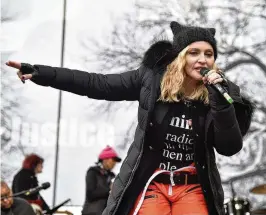  ?? THEO WARGO / GETTY IMAGES / TNS ?? Madonna performs onstage during the Women’s March on Washington in 2017in Washington, D.C.